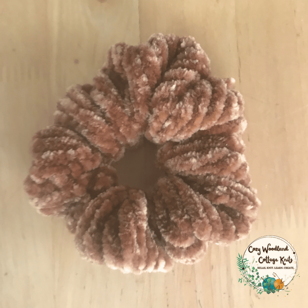 a caramel (tan brown) velvet scrunchie