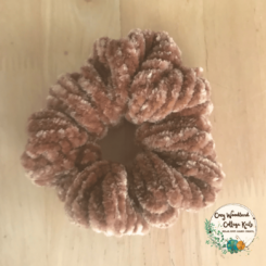a caramel (tan brown) velvet scrunchie