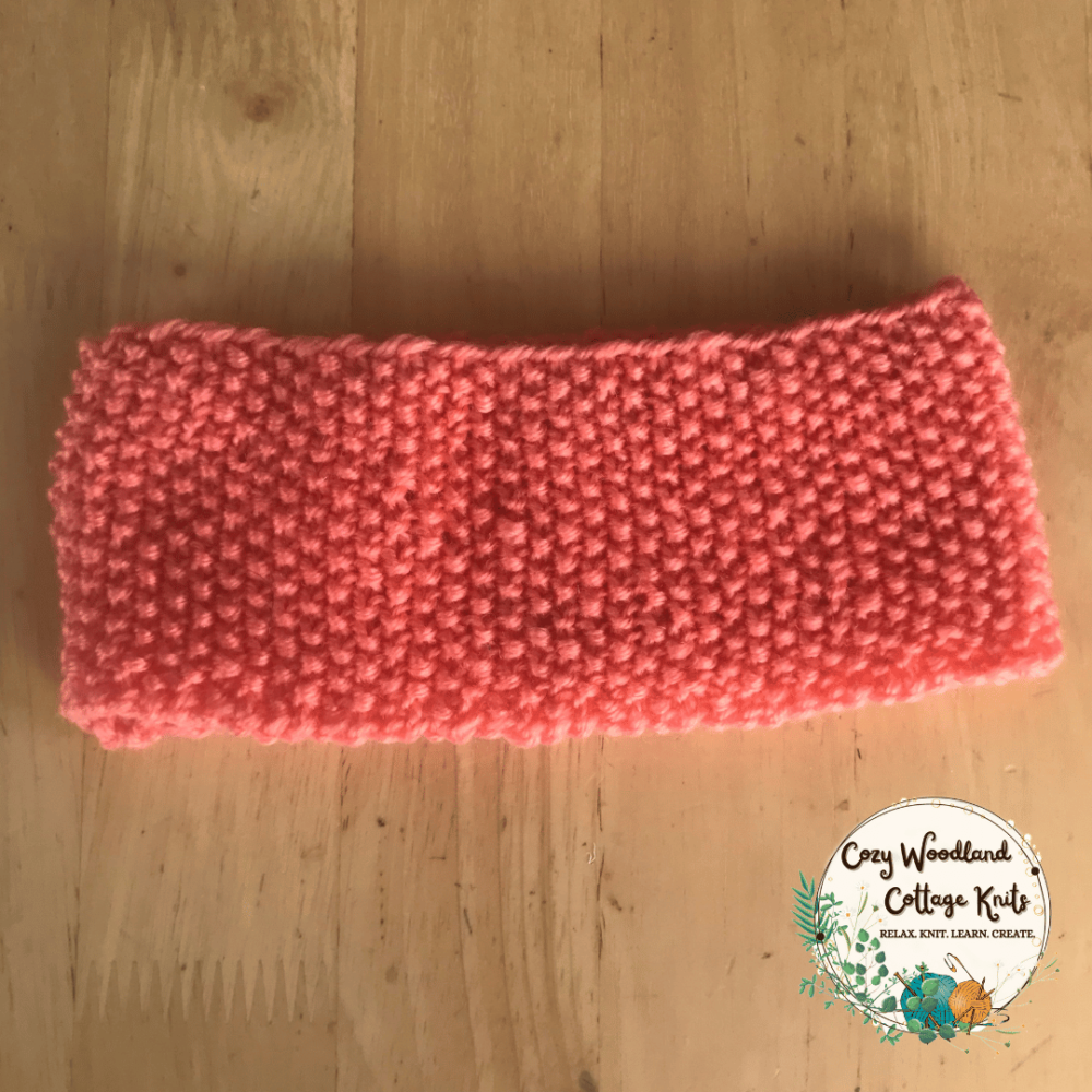 A coral toddler headband