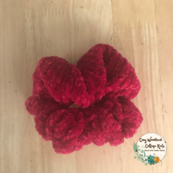 a red velvet scrunchie