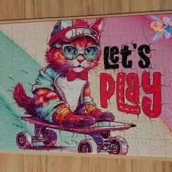 printed puzzle with vibrant colours and cat on skateboard