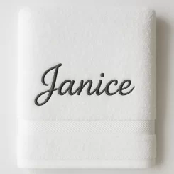 embroidered name on white bath towel