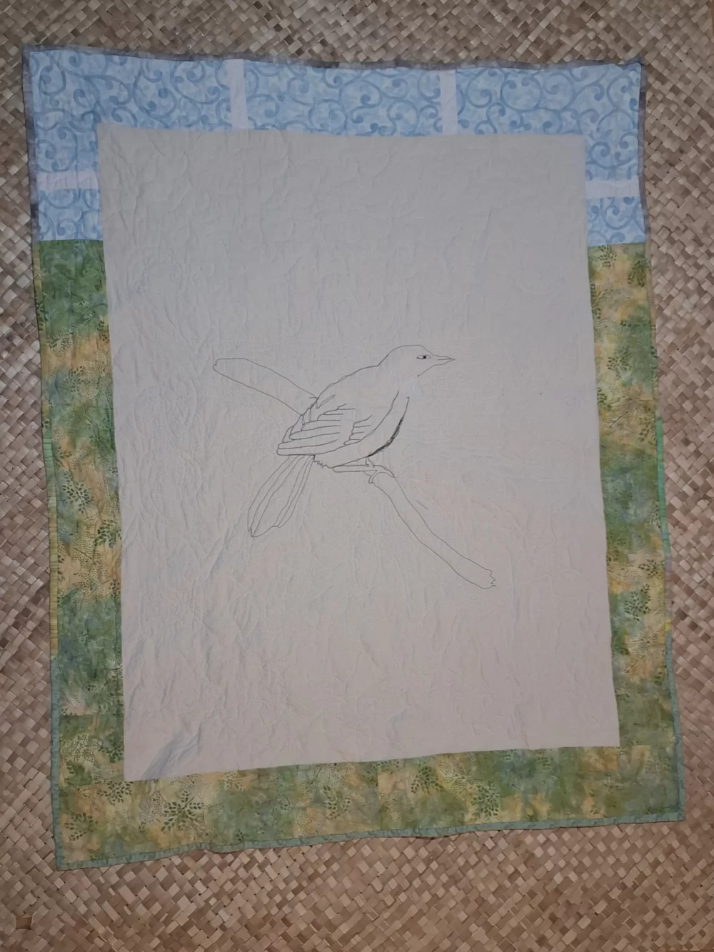 Tui in a Kowhai tree quilt