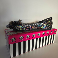 inner side profile of holographic skulls and bones flat shoes