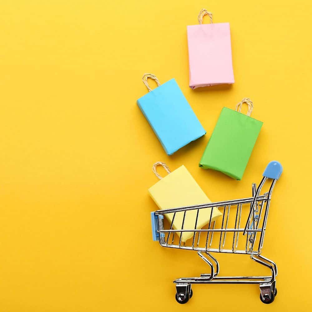 A shopping cart filled with bags, representing an easy and secure checkout experience for New Zealand shoppers.